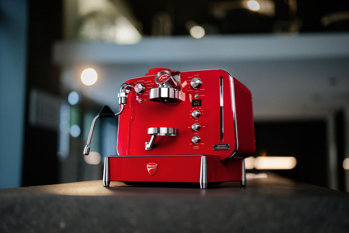 Red Barista M3 by Ducati capsule coffee machine in a kitchen