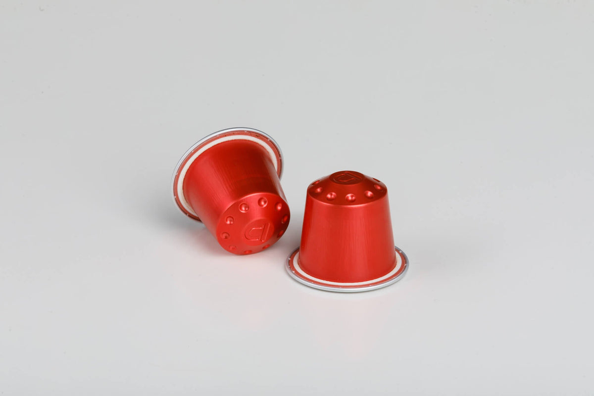 Two red Espresso by Ducati coffee capsules for Nespresso® Original machines